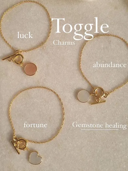 My toggle bracelets are on sale. This image shows a variety of charms in moonstone and pink opal, for luck, abundance, and fortune.