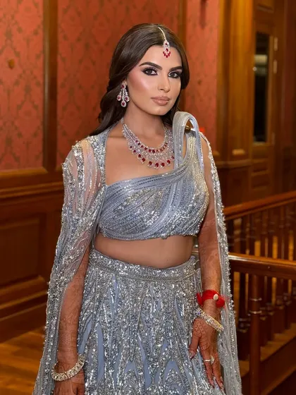 The full look. Kanu looks like a vision in this icy blue lehenga, and the makeup adds the perfect touch of glamour.