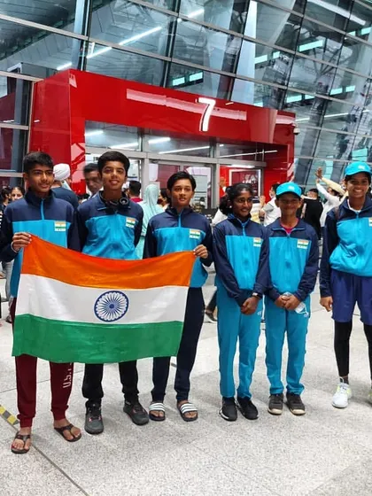 The Indian U-12 team, led by me, at the airport ready to depart for the international tournament in Islamabad, Pakistan. We prepare players for the pressures of travel and competition.