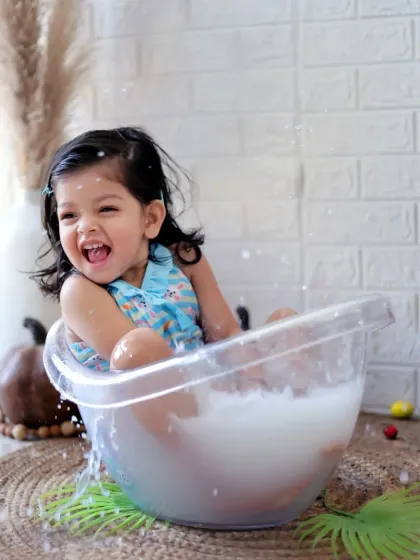 Pure happiness in a tub! Our milk bath or bubble bath photoshoots are a fantastic way to capture carefree, joyful moments in a unique and artistic setting.