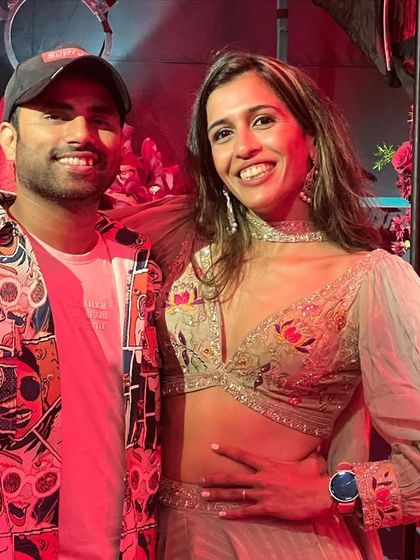 A picture with the happy couple after a successful sangeet. Building these bonds with my clients is the best part of my job.