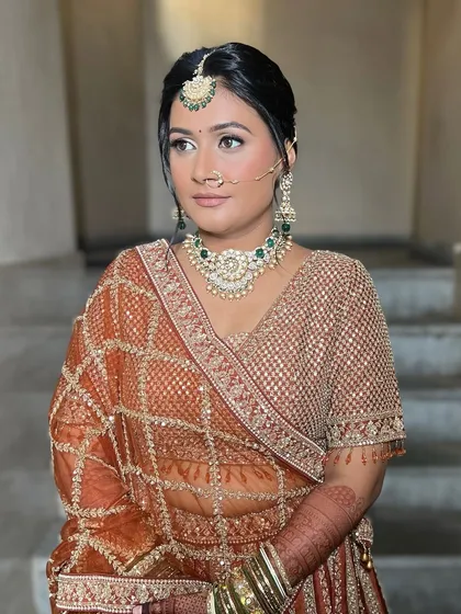 Another angle of this beautiful bridal look, showing how the makeup looks from different perspectives. The contour is soft and the glow is consistent.