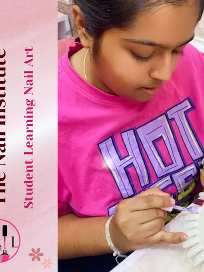 This student is practicing her nail art on a color wheel, building her portfolio of designs.