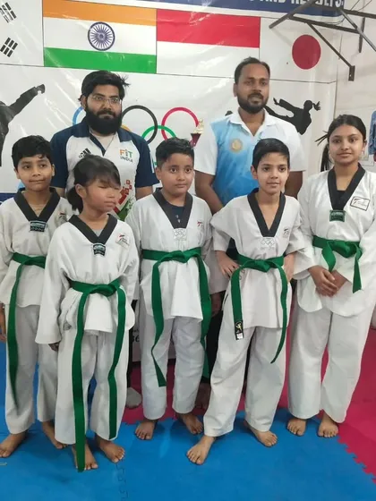 Our new green belts, who have moved up from the beginner level and are ready to learn more complex forms and sparring techniques.