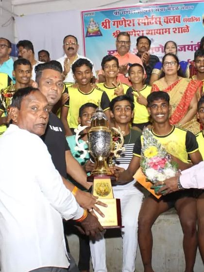 A moment of celebration as the team is presented with the main championship trophy.