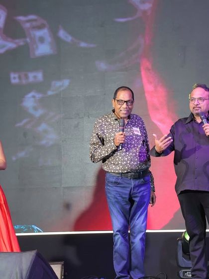 Facilitating an interactive segment with speakers on stage, ensuring the session is engaging and flows smoothly.