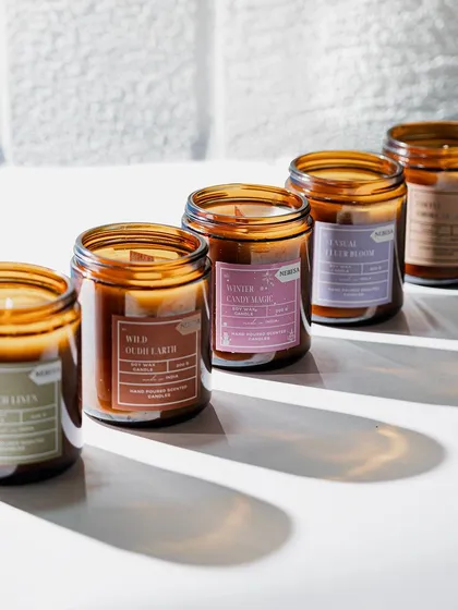 My scented jar candles are perfect for creating a cozy atmosphere at home. This collection shows some of my most popular fragrances like Wild Oudh, Soft French Linen, and Sensual Fleur Bloom, all hand-poured into classic amber jars with natural soy wax for a clean, long-lasting burn of over 48 hours.