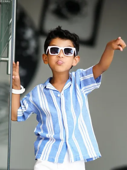 This little guy is turning five! A fun and stylish birthday shoot capturing his confident personality with sunglasses and a great pose.