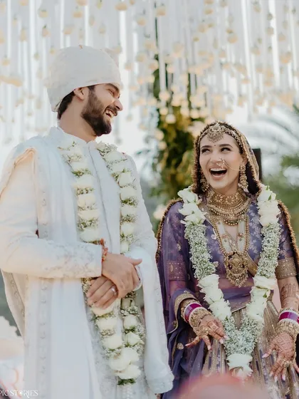 The pure, unadulterated joy of a wedding ceremony. Yash and Riti's laughter during their pheras in Udaipur is a perfect example of the candid, emotional moments that I believe are the true heart of a wedding.