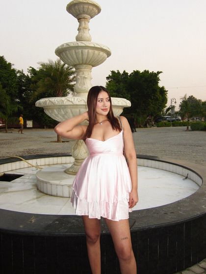 Another shot of the cute pink babydoll dress.
