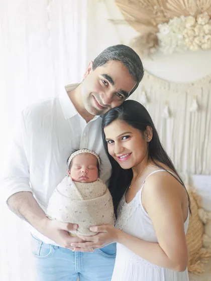 A happy family of three. This portrait, taken against a lovely boho-style backdrop in my studio, is full of warmth and joy.
