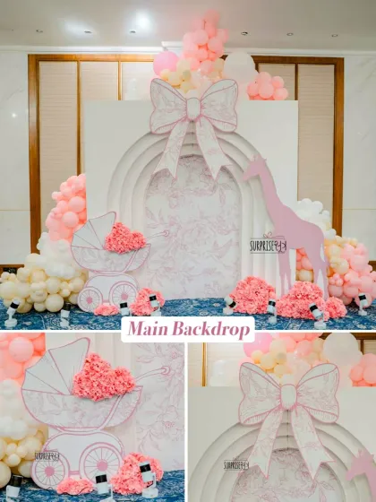 For this special baby welcome, the family wanted something truly luxurious, so I designed this Dior-inspired main backdrop. The intricate details, soft pink and white palette, and custom-made props like the baby carriage created an atmosphere of pure elegance.