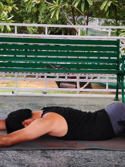 Gupta Padmasana, or the Hidden Lotus Pose, is a deep relaxation pose. I teach this to help correct postural defects of the spine and as a posture for meditation to reduce stress and anxiety.