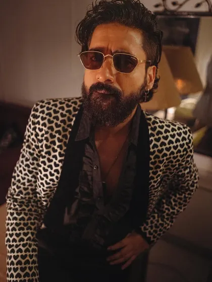 A retro-glam makeover for the talented Roy Sanyal. We channeled an 80s film star vibe with styled hair and a sharp, defined look.