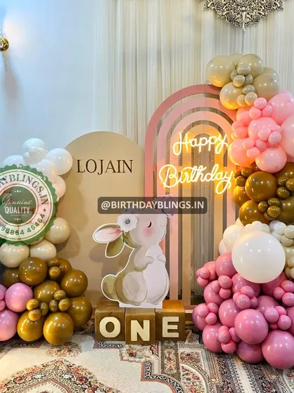 A modern and chic first birthday with a bunny theme. The color palette of pink, brown, and cream is sophisticated and sweet.