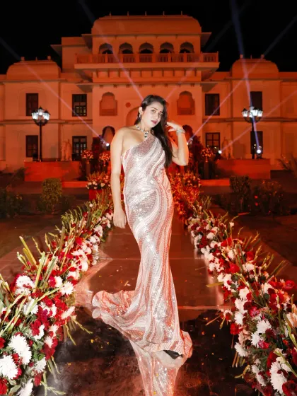 My sequined gown shimmered beautifully under the lights at this Shiv Vilas wedding. I believe in dressing the part to add to the overall magnificence of the celebration.