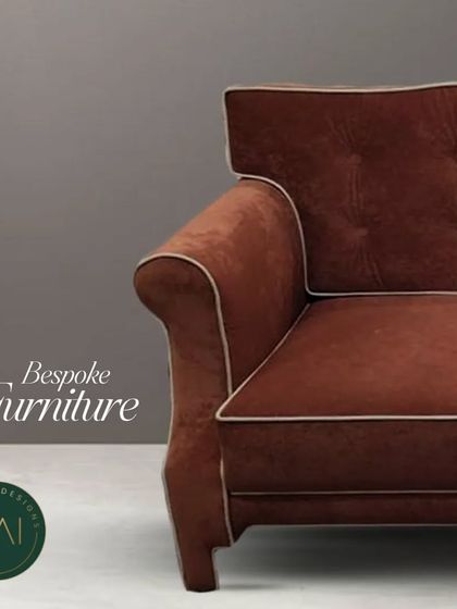 A close-up of a classic sofa in a rich terracotta velvet, featuring delicate white piping and a gently curved back. This piece highlights our expertise in traditional upholstery and fine detailing.