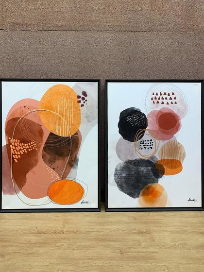 The full view of the two abstract pieces. Sized at 24x32 inches each, they make a significant statement while maintaining a minimalist feel thanks to the clean framing.