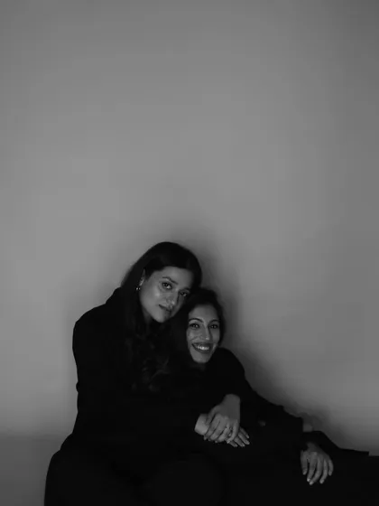 Two friends, Amira and Anahita, sharing a quiet moment of connection. This is the kind of intimacy I strive to capture, creating a safe space where vulnerability feels like strength.