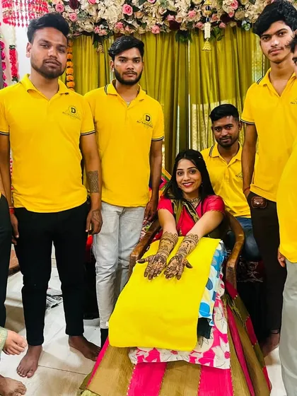 Our team of artists with a bride-to-be. We can deploy a large team to ensure all your guests get their mehndi done efficiently.