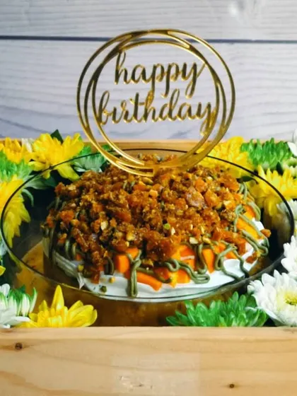 A tropical delight for a birthday, this is my Mango Pistachio Tres Leches. It features a moist sponge soaked in mango-flavored milk, topped with pistachio praline and fresh mango.