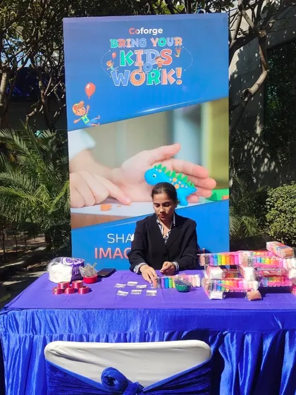 My staff member is ready to assist children at the clay modeling station, ensuring a smooth and enjoyable experience for everyone.