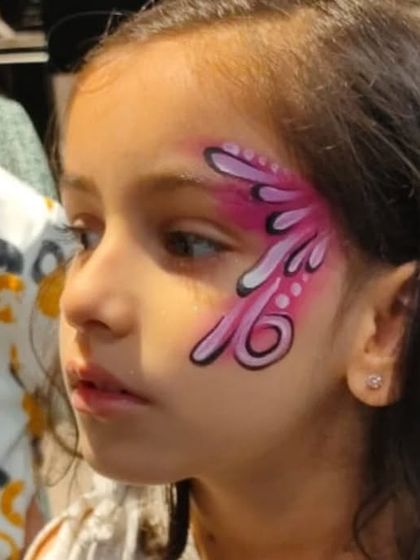 An abstract pink design with bold black linework, creating a unique and artistic look.