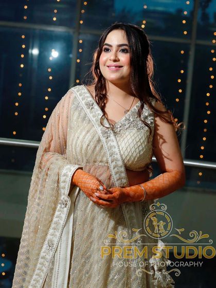 A beautiful candid shot of this engagement beauty. Her makeup is soft and luminous, designed to look stunning both in person and in photographs.