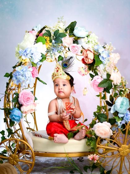 Celebrate tradition with our special Krishna-themed setup. We use the floral carriage prop and provide accessories to create an authentic and adorable look for Janmashtami or any milestone.