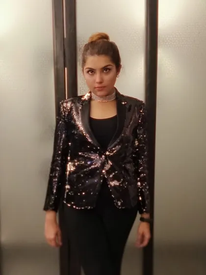Dhruvi's fit check before a wedding performance. Our look is always sharp, professional, and ready for a party.