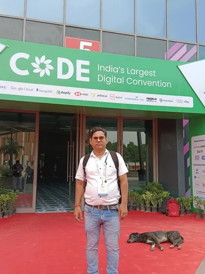 To bring the best strategies to my clients, I stay active in the industry. This is me at the entrance of CODE, India's Largest Digital Convention, where I connect with other experts and learn about the latest trends.