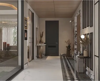 This view of the foyer shows the interplay of different materials and sightlines. The dark door, checkerboard floor runner, and glass partitions create a dynamic and layered entry experience.