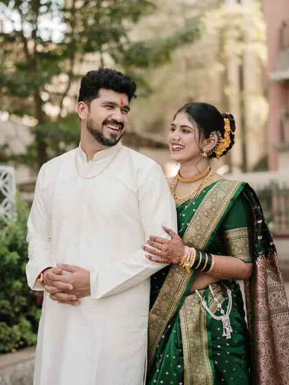 A shared laugh between partners. We love capturing these candid interactions that reveal the true nature of a couple's bond, making their wedding photos personal and memorable.
