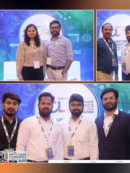 Professionals from the logistics industry posing at our booth. It's a great way for teams to get a fun photo together during a work event.