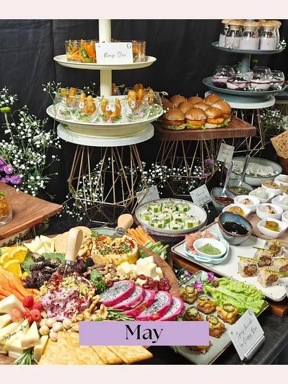 A vibrant grazing table from a May event, showcasing a wide array of our offerings. This image captures the essence of a bountiful spread, perfect for any large celebration.