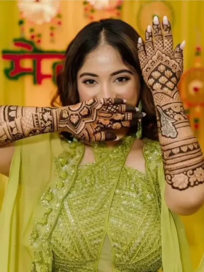This bride is all set for her function, showing off her unique henna designs.