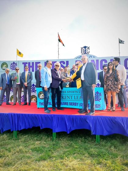 A handshake celebrating a successful partnership and a thrilling race day at the HPSL Bangalore Derby. These moments define the spirit of sportsmanship at our club.