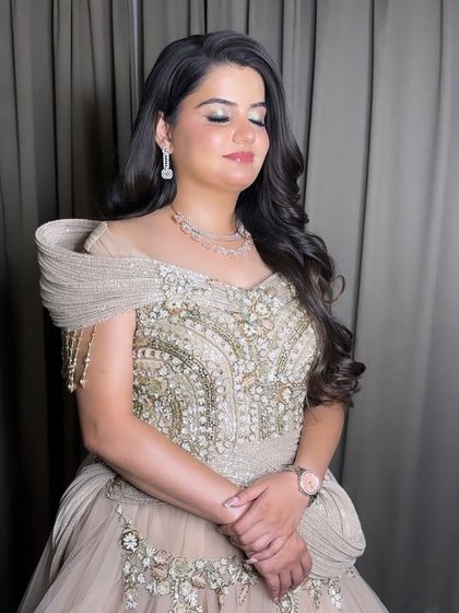 A beautiful, soft glam look for a Sangeet. I used a hint of mint green shimmer on the eyes to add a unique touch to the otherwise neutral and glowing makeup.