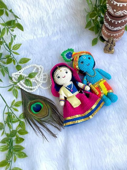 The divine couple, Radha and Krishna. I made this beautiful pair to celebrate the festival of Holi. Radha's lehenga and Krishna's turban are crafted with bright, festive colors.