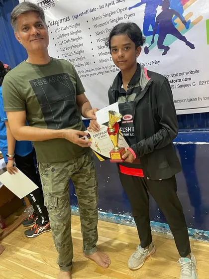 Anriya Singh receiving her runner-up trophy at the Shuttle Storm tournament. Her consistent performance is inspiring.