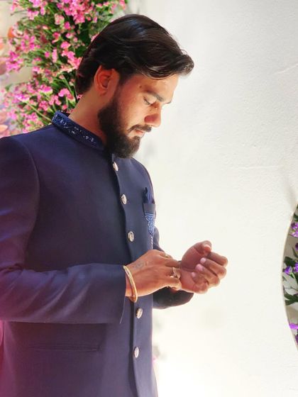 A close-up shot, adjusting my ring before the Ranchi show. It's the small rituals that prepare you for the big stage.