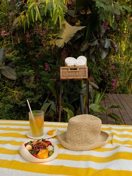 At the poolside, everyday concerns drift away, leaving only the rhythm of the breeze and the gentle pull of the water.