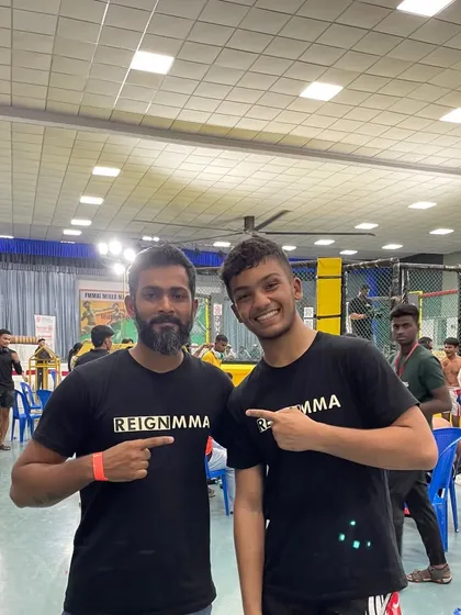 Celebrating a hard-earned victory with Almeer. Positive results are inevitable when a fighter trusts the process and the training environment is built for real-world application.