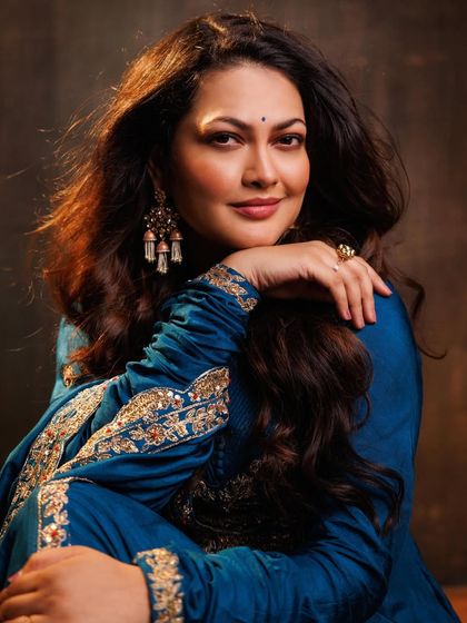 A stunning portrait of singer Priyanka Barve. I styled her in a royal blue Anarkali with intricate gold embroidery for a regal and timeless photoshoot.