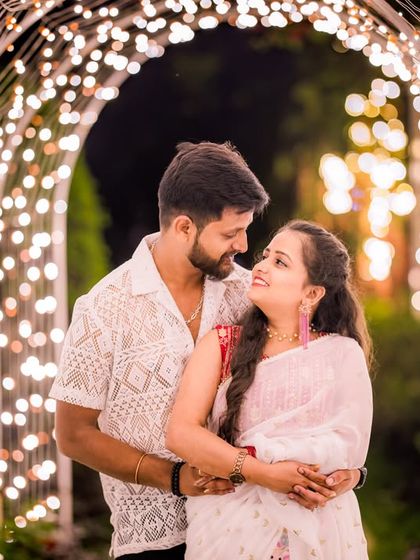 An intimate moment for a couple in the light tunnel, a perfect spot for capturing romance.