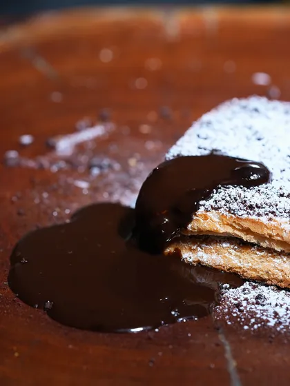 This is my 100% vegan Chocolate French Toast. It’s the ultimate guilt-free indulgence, with warm, decadent chocolate sauce over perfectly crisp toast. It’s pure comfort on a plate.