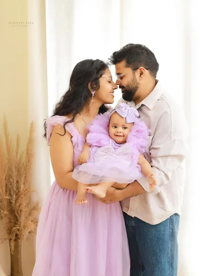 Our indoor studio sessions are all about capturing closeness and connection. The coordinated lavender outfits and our bright, airy setup make for a timeless and intimate family portrait.