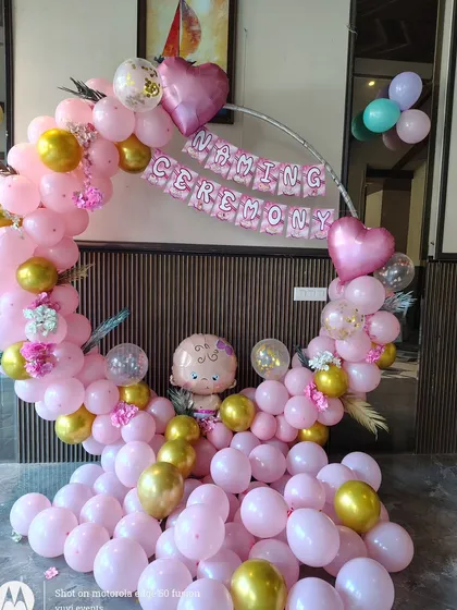 A closer view of the pink balloon ring for the Naming Ceremony.