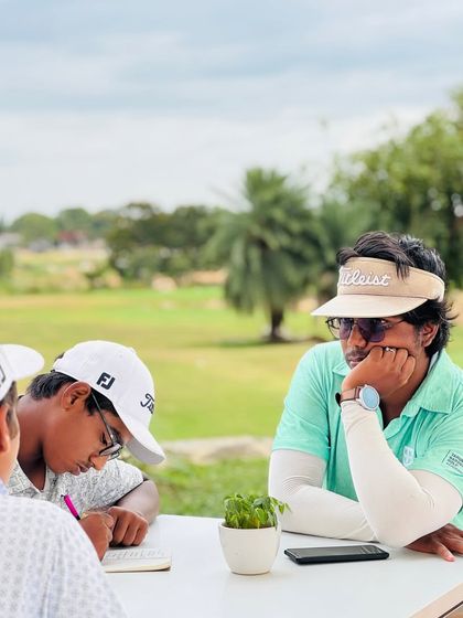 Senior Coach Hari is our quiet force, Mr. Dependable. He brings technical precision, using video analysis and smart planning to help every student train with purpose. He is our data brain and planning expert.