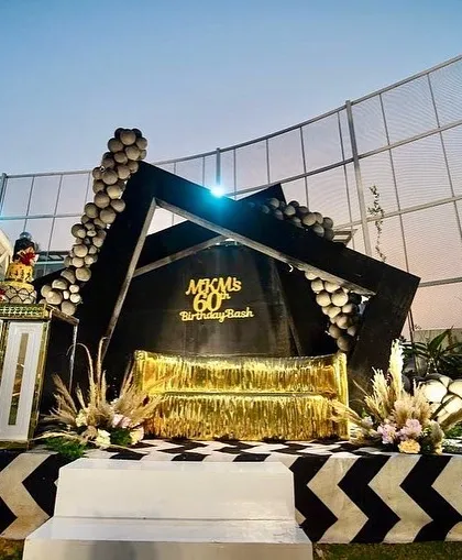 The modern, geometric stage for the 60th birthday bash was custom-built in our workshop.